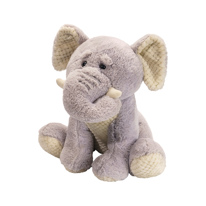 Nakaupo na mga plush toy ng elepante na may mahabang ilong at malalaking tainga